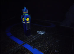Drawing of London at night from above, with Big Ben in 